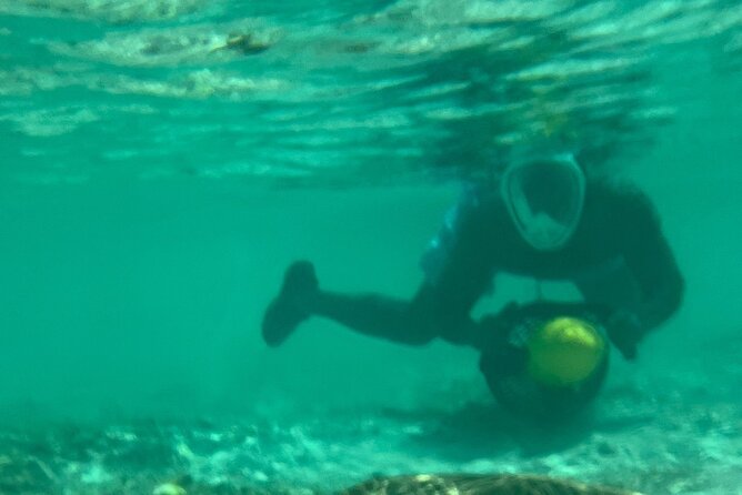 Bahamas Sea Scooter Snorkeling Adventure - Riding a sea scooter near Paradise Cove