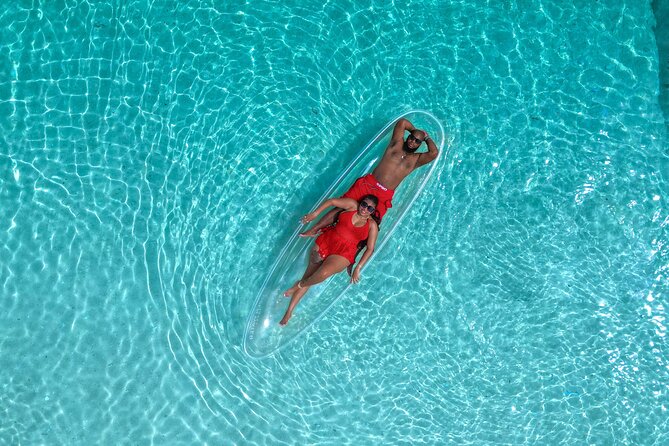 Clear Kayak Drone Photoshoot in Nassau Bahamas - The people guiding the camera and kayak