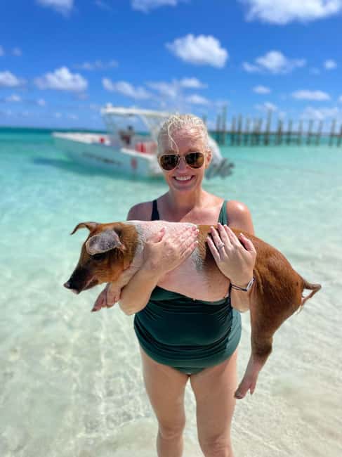 Nassau: 3-Island Snorkel Tour with Pigs, Beach Club, & Lunch - Guides, music, and the feel on board