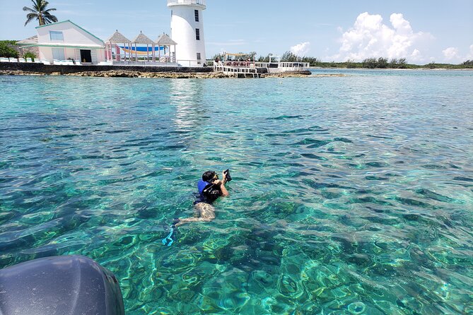 Rose Island: Private Snorkeling, Fishing, and Swimming with Pigs - Passing Paradise Island and the old TV island