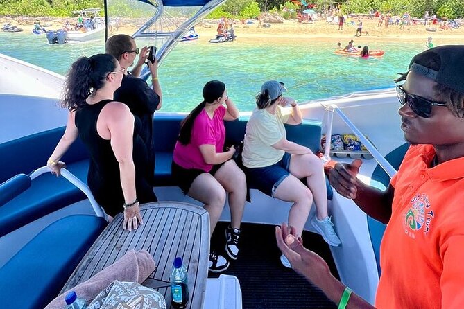Semi Submersive Glass Bottom Boat Eco Tour in Paradise Island Bahamas - Four reef stops and fish below the boat