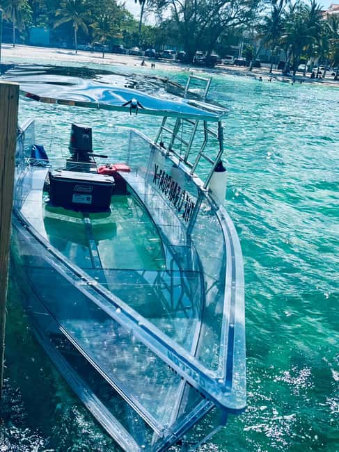 The Clear Boat Experience Bahamas drinks and snacks included - Floating bar, lunch, and water sports